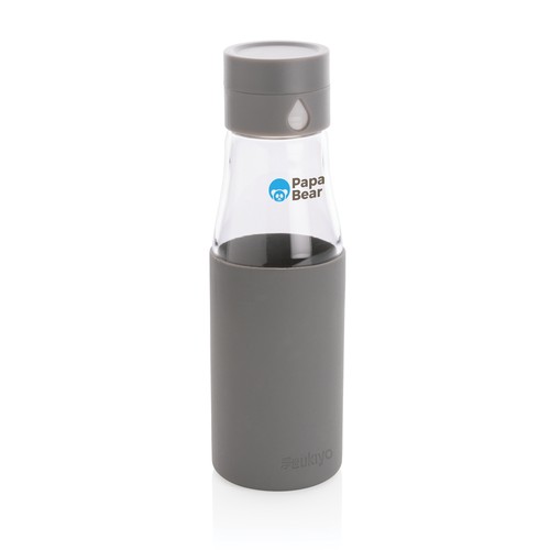 Ukiyo glass hydration tracking bottle with sleeve