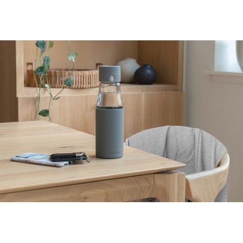 Ukiyo glass hydration tracking bottle with sleeve